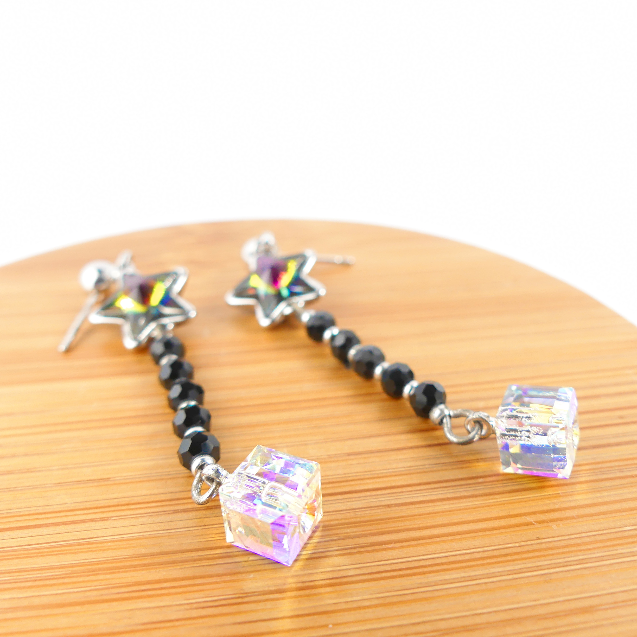 boucle d'oreille pendantes étoile verte reflet