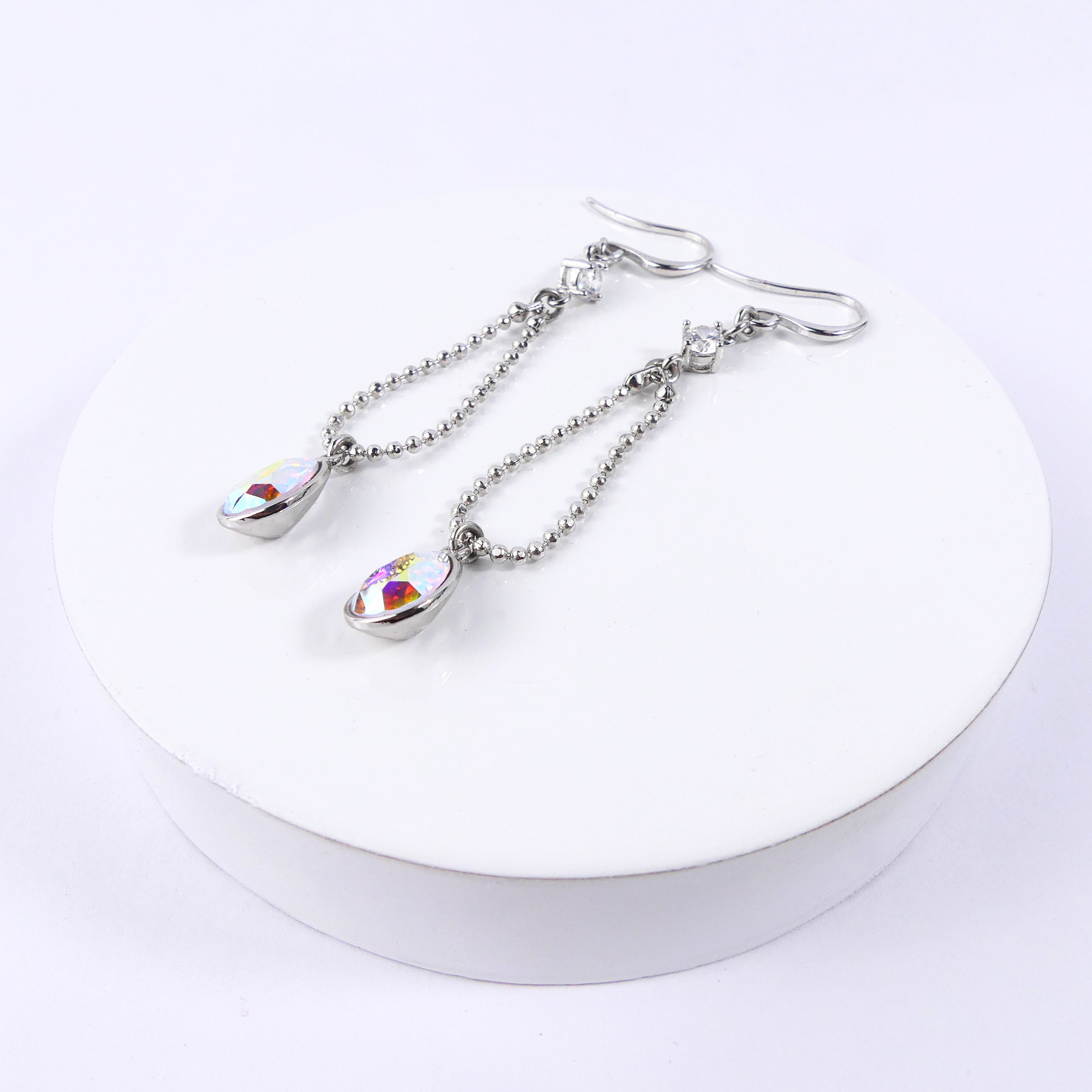 boucle d'oreille goutte reflet