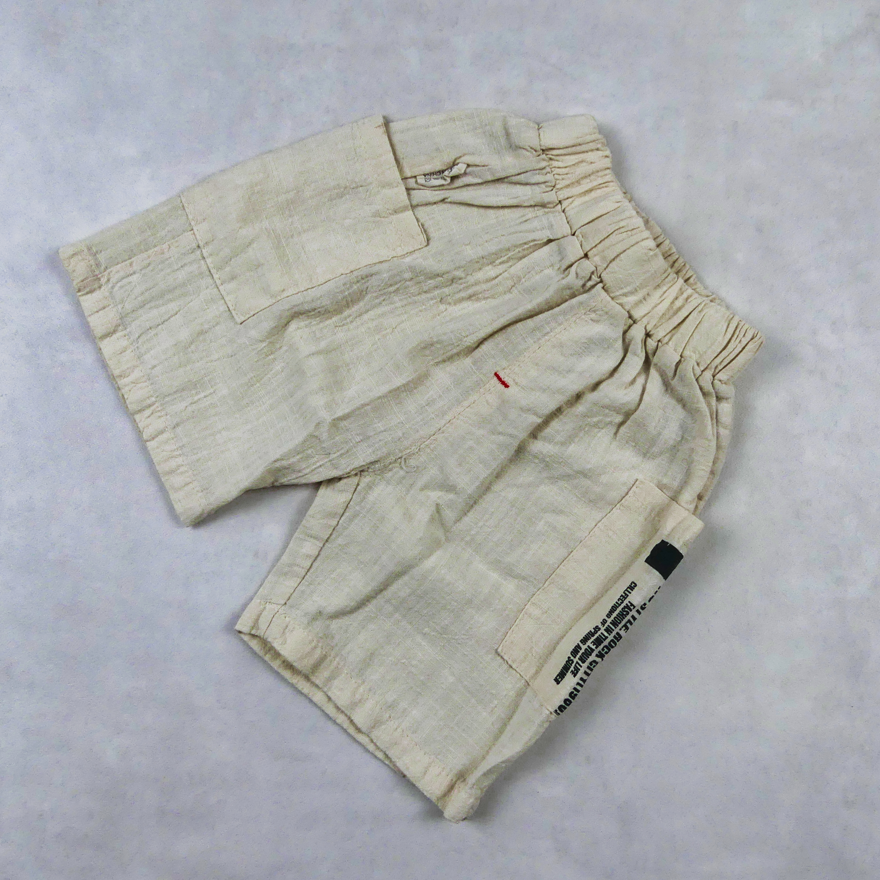 ENSEMBLE GARCON debardeur ROUGE AVEC SHORT BEIGE MOTIF HOLYWOOD 