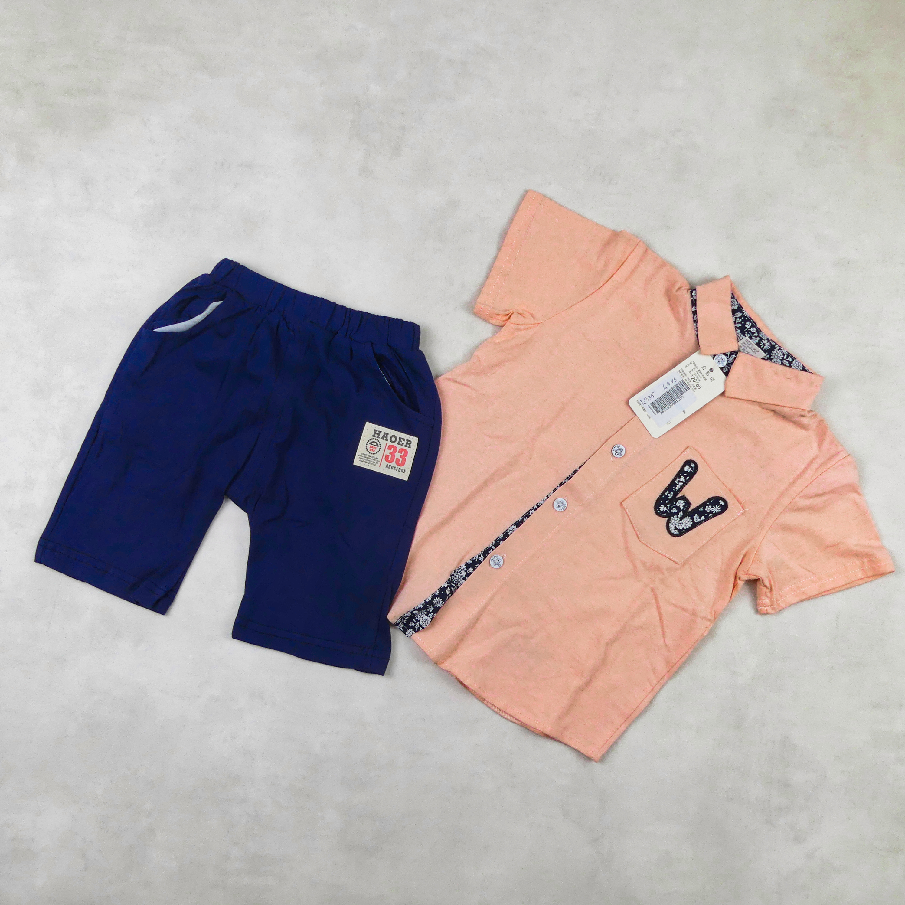 ENSEMBLE CHEMISIER SAUMON AVEC SHORT BLEU MOTIFE -W-