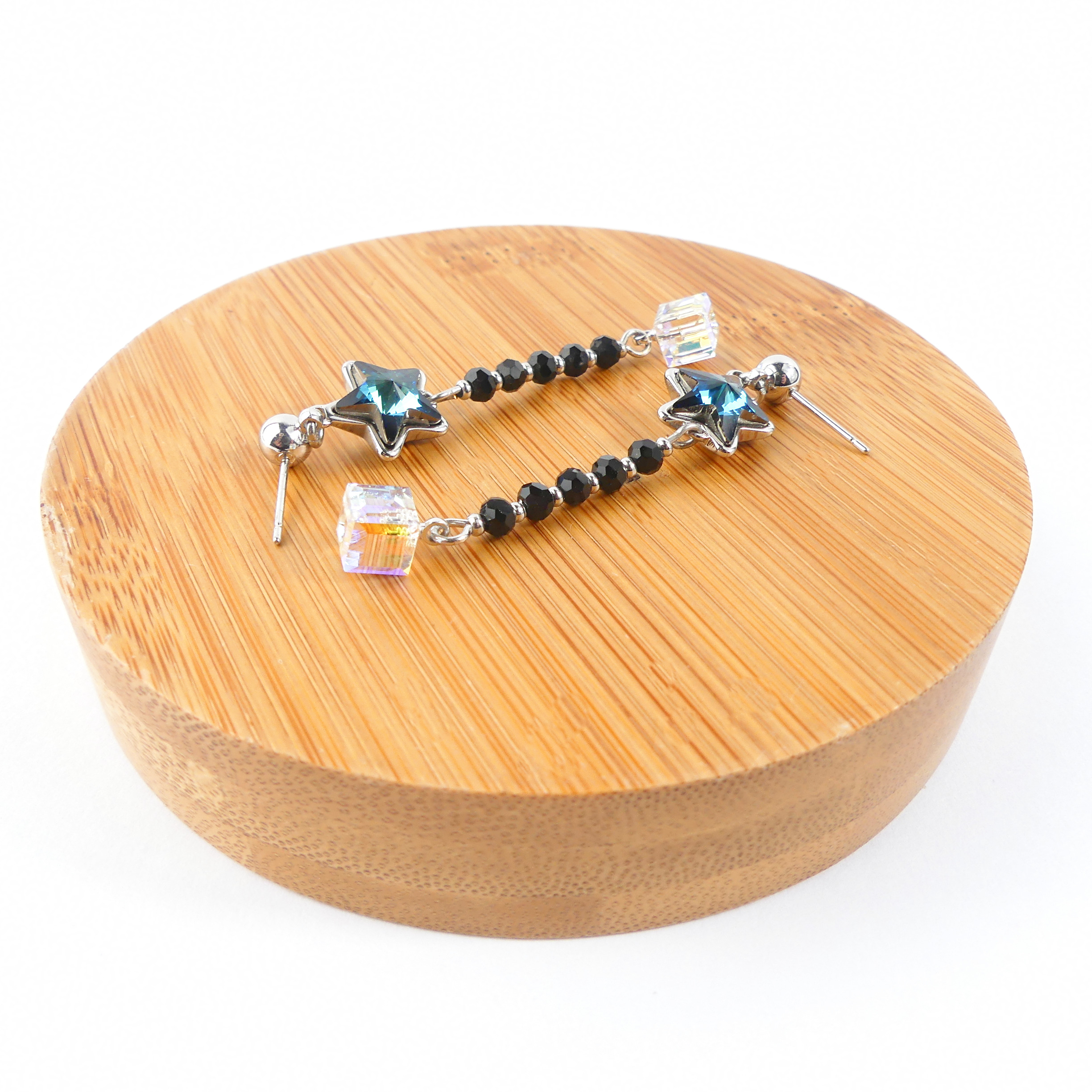 boucle d'oreille pendantes étoile bleu reflet