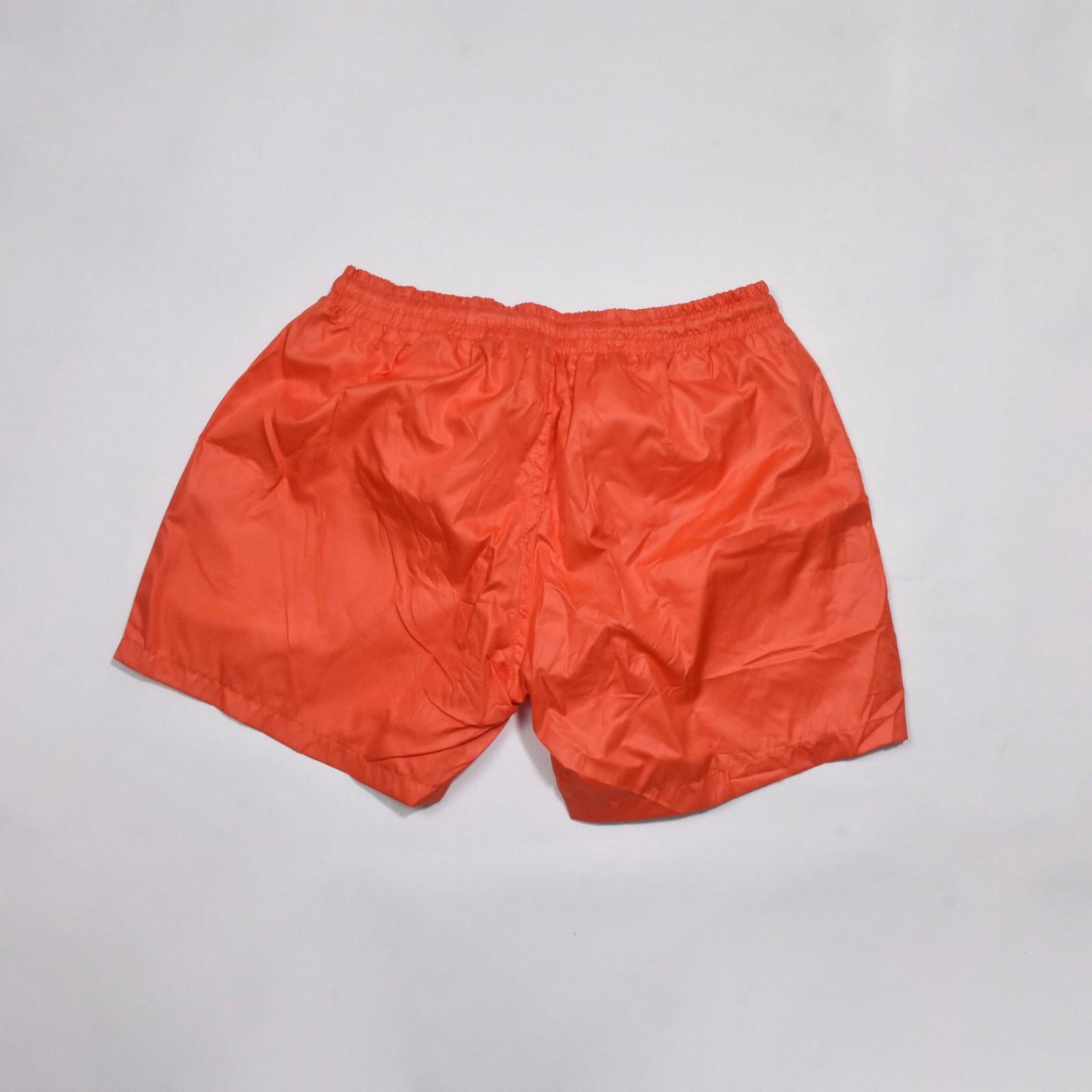 SHORT ROUGE BRIQUE MOTIF SOLEIL 