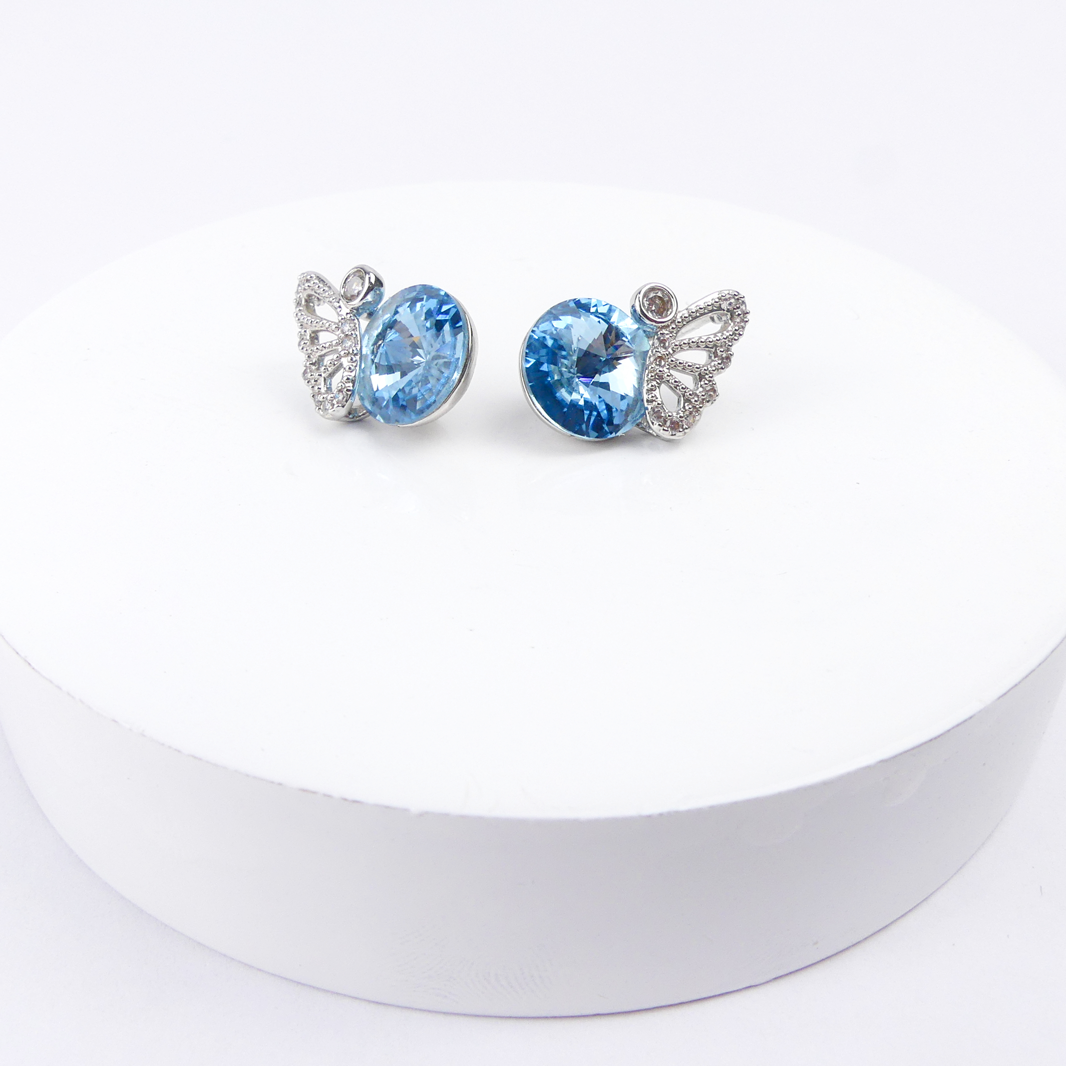 boucle d'oreille aile bleu 