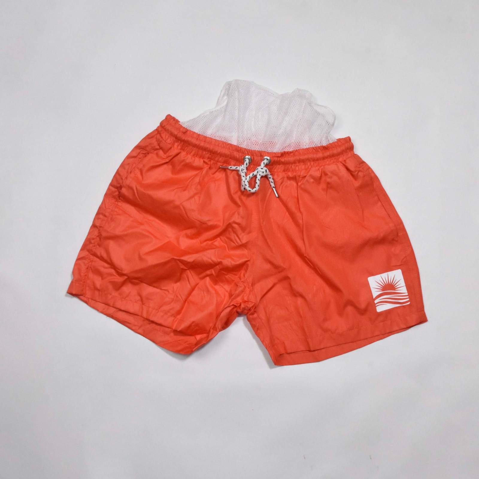 SHORT ROUGE BRIQUE MOTIF SOLEIL 