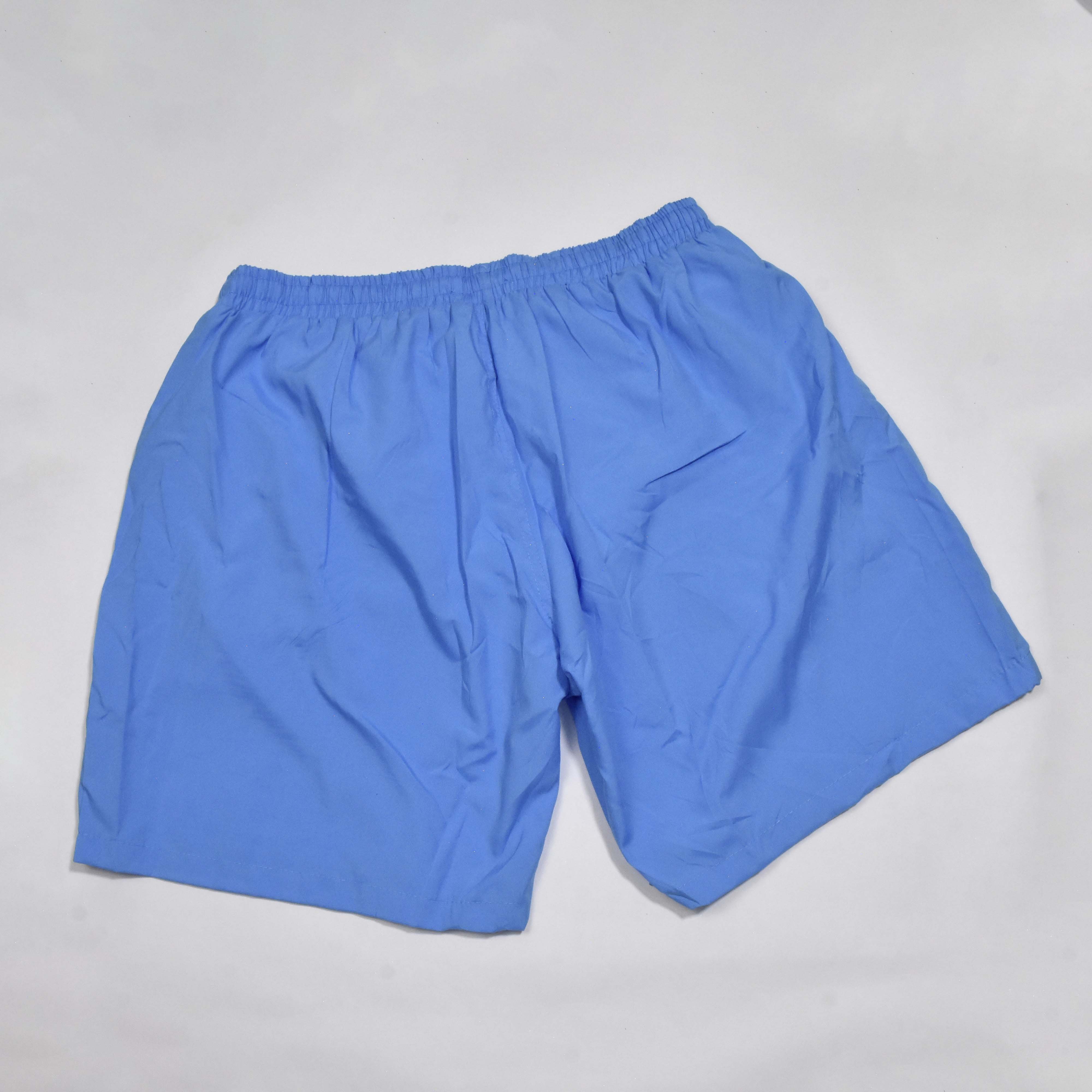 SHORT BLEU MOTIF SOLEIL