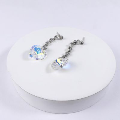 boucle d'oreille pendantes coeur  jaune reflé