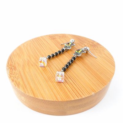 boucle d'oreille pendantes étoile verte reflet