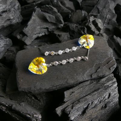 boucle d'oreille pendantes coeur  jaune reflé